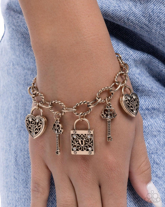Flirty Filigree-Gold charm Bracelet
